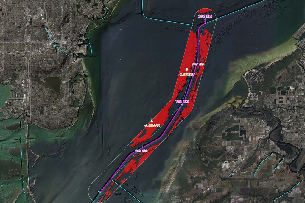 The image shows a map of a coastal area. It shows a vessel route in pink and analysis such as keel clearance calculations, and ridge and valley detection. 